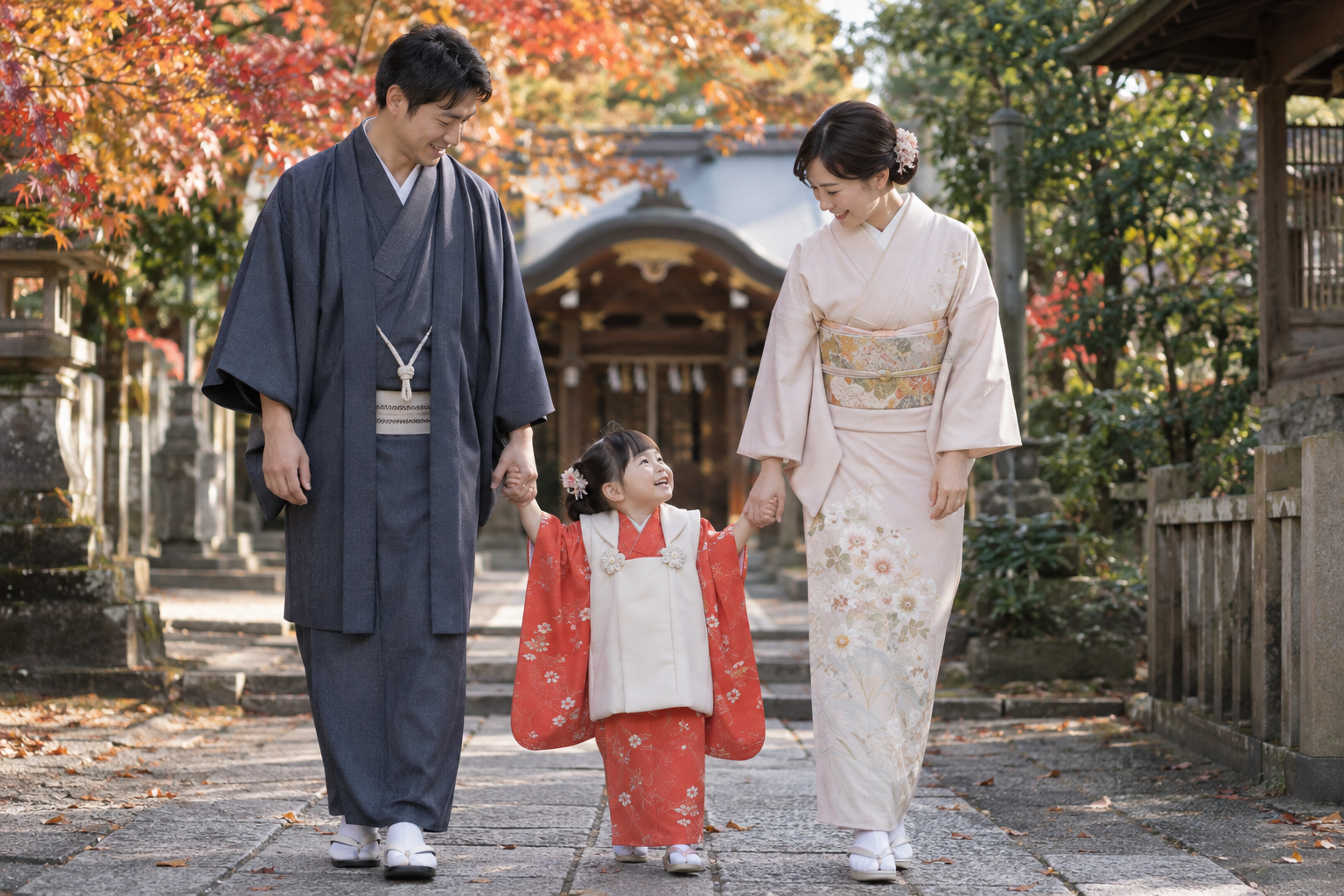 七五三で神社を訪れた3歳の子どもと両親